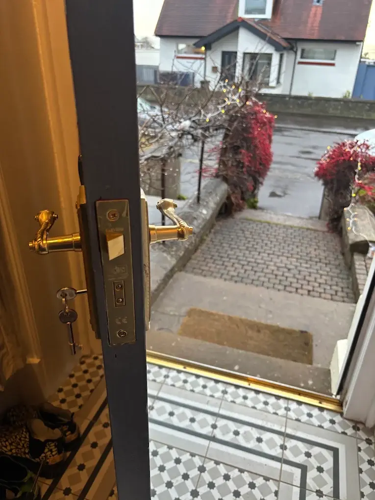 Entrance door of the home is repair and new Lock is Installed with Keys Hanging in lock near Planada